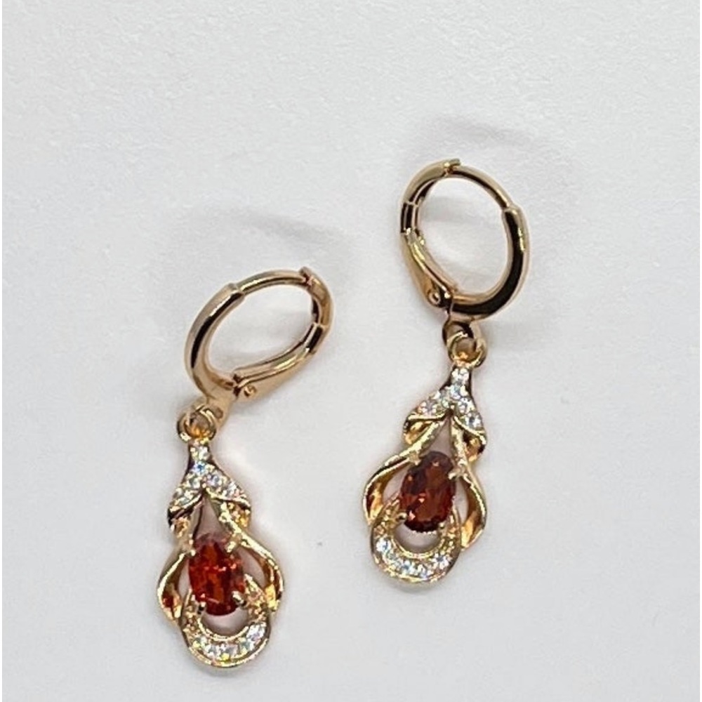Red stone dangle earrings.